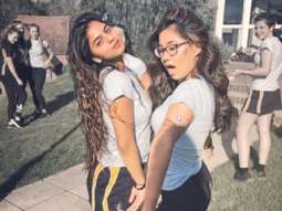Suhana Khan is a ray of sunshine while striking a pose with a friend