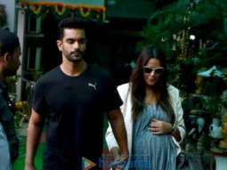Neha Dhupia and Angad Bedi snapped outside a hospital in Khar