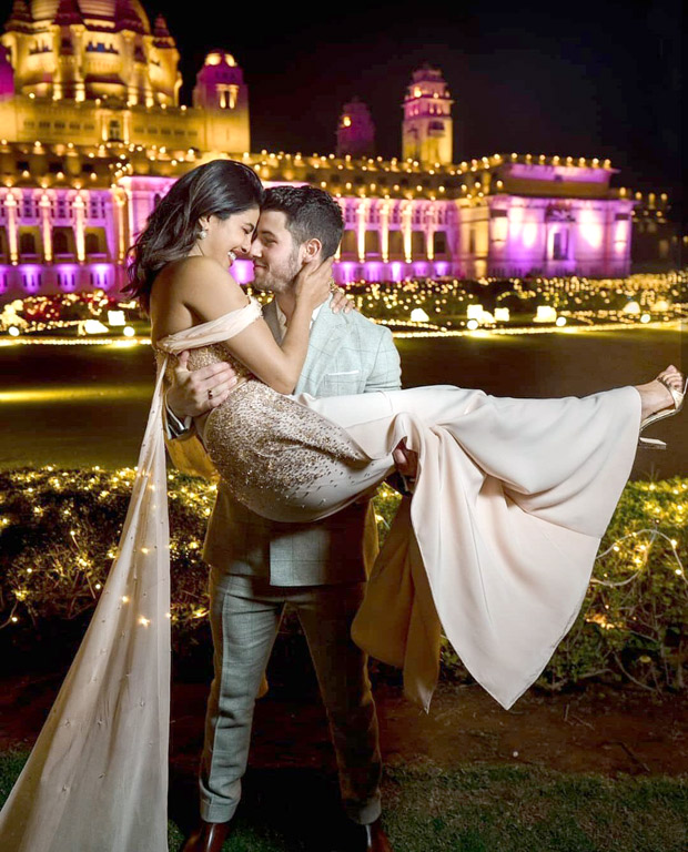 Priyanka Chopra is swept off her feet by hubby Nick Jonas in this lovely dovey wedding photo