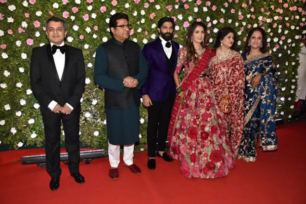 Last night, Raj Thackerey’s son Amit Thackerey tied the knot with fashion designer Mitali Borude. The couple got engaged in December, last year in a small family-only function. With the wedding reception held in Mumbai yesterday, the Thackereys decided to invite a handful of Bollywood actors along with some prominent politicians. Actors like Shah Rukh Khan, Amitabh Bachchan, Salman Khan, and Madhuri Dixit attended the event to congratulate the newlyweds. Dressed in a three-piece suit, Shah Rukh looked dapper as ever. While Salman went for more of a look with leather jacket and a t-shirt paired with denims, Big B pulled off an indo-western look clearly giving most of the young actors a run for their money. Check out inside pictures from the reception. It surely was a glamorous night. Here’s congratulating the newly wed couple a happy married life! 