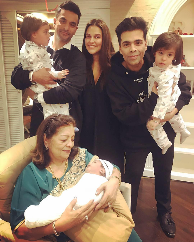 Karan Johar's twins Yash and Roohi turn two, Neha Dhupia shares a sweet of photo of her daughter Mehr meeting them Karan Johar's twins Yash and Roohi turn two, Neha Dhupia shares a sweet of photo of her daughter Mehr meeting them