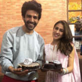 Sara Ali Khan and Kartik Aaryan celebrate their Filmfare Awards and Zee Cine Awards win on Imtiaz Ali's film set