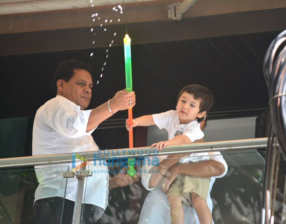 Taimur Ali Khan spotted playing Holi in his balcony