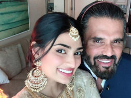 Athiya Shetty and Suniel Shetty are all smiles as they pose for a selfie at a wedding