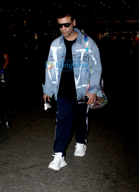 sonam kapoor ahuja anand ahuja and karan johar snapped at the airport 2