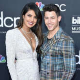 BBMAs: Priyanka Chopra steals a KISS from Nick Jonas, cheers with Sophie Turner & Danielle Jonas during Jonas Brothers’ performance