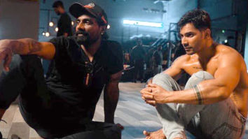 Remo D’souza and a shirtless Varun Dhawan look lost in an intense discussion in this behind-the-scenes picture from Street Dancer 3D