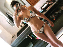HOT! Sunny Leone gets all set for a swim in her sexy floral bikini in Jaipur!