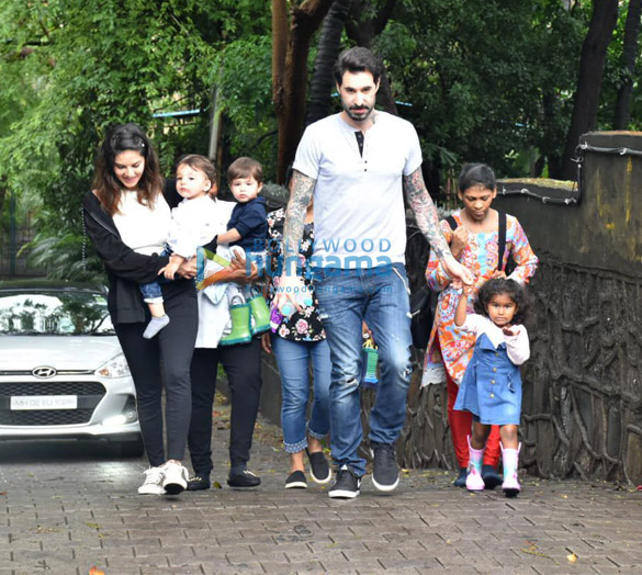 Photos: Sunny Leone and Daniel Webber snapped with their kids at play school in Juhu Photos: Sunny Leone and Daniel Webber snapped with their kids at play school in Juhu
