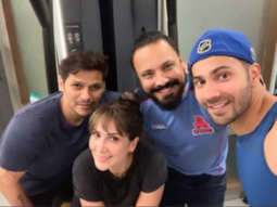 Woah! This photo of Varun Dhawan and Kim Sharma coincidentally bumping into each other in the gym has left us SURPRISED!