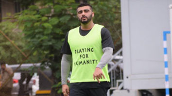 Arjun Kapoor and Mahendra Singh Dhoni snapped during a football match practice