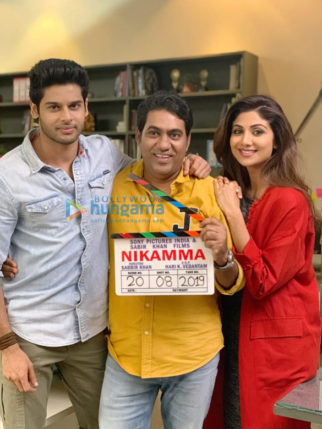 on the sets of the movie Nikamma