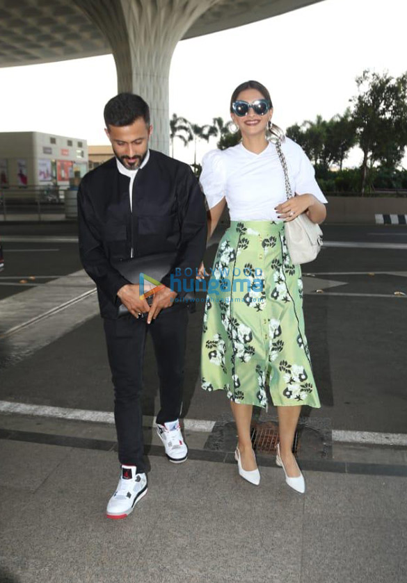 Photos: Sonam Kapoor Ahuja and Anand Ahuja snapped at the airport