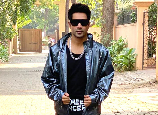 Varun Dhawan dons a metallic track suit along with retro shades just when he thought he couldn’t look more dapper!