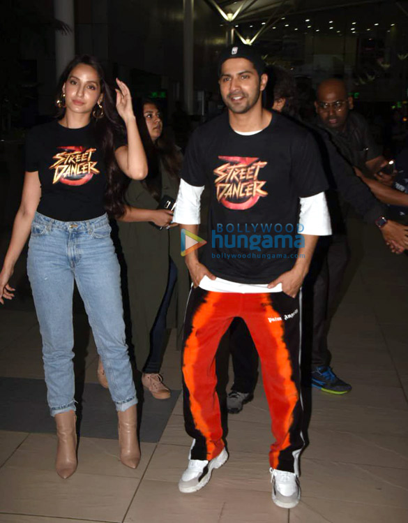 photos varun dhawan and nora fatehi snapped at the airport 3