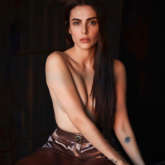 The mercury is rising! Mandana Karimi goes topless in her latest photo