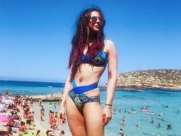 Rakul Preet Singh oozes hotness as she chills under the sun in a blue bikini