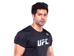 Watch: Varun Dhawan delights fans at the airport by gifting them roses