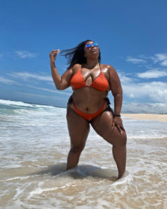 Lizzo enjoys beach vacation in red bikini during her trip to