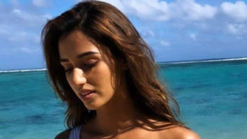 HOT: Disha Patani welcomes summer with a white and pink SWIMSUIT