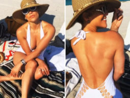Jennifer Lopez soaks under the Miami sun flaunting her toned body in white halter-neck swimsuit