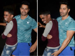 Varun Dhawan surprises a paparazzi as he lifts him his arms in this viral video