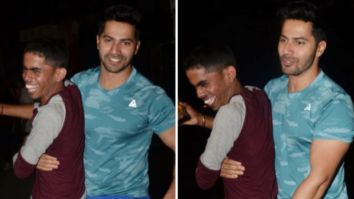 Varun Dhawan surprises a paparazzi as he lifts him his arms in this viral video