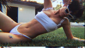 Halsey sets the internet ablaze while flaunting her stunning curves in white bikini