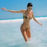 Kendall Jenner sizzles in tiny bikini flaunting her enviable beach body as she yearns for another vacation 