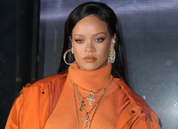 Rihanna tells fans to stop asking about her album, says "she is trying to save the world unlike their President'