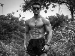 Tiger Shroff flaunts his killer washboard abs in this black and white photo