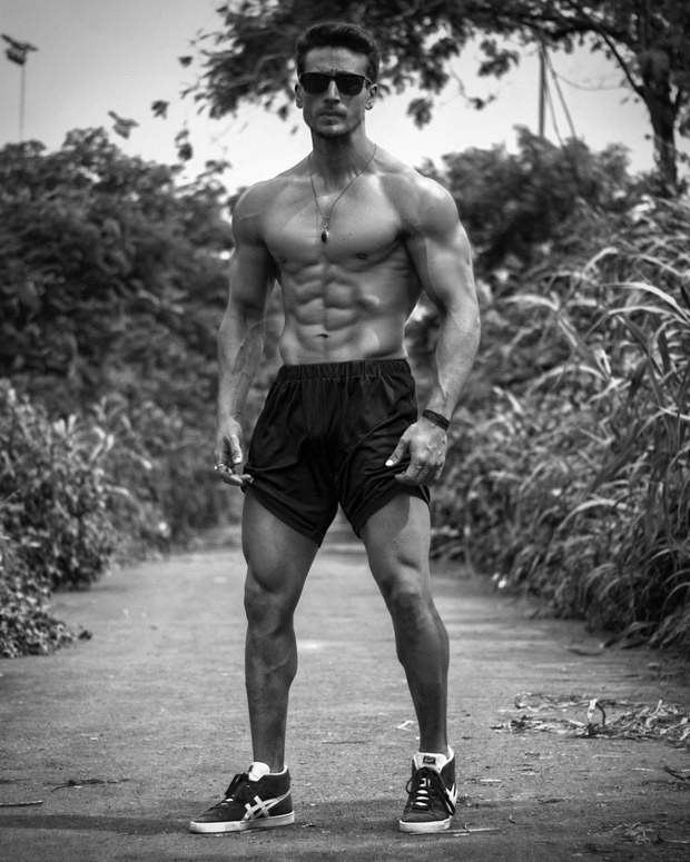 Tiger Shroff flaunts his killer washboard abs in this black and photo