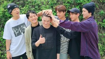EXO members come together to support Suho as he enlists in military
