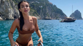 Amy Jackson stuns in brown two piece bikini whilst swimming in Capri