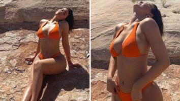 Kylie Jenner soaks in the sun in tiny orange bikini during her vacation at Canyon Point
