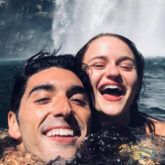 The Kissing Booth 2 stars Joey King and Taylor Zakhar Perez swim under a waterfall during their getaway with friends