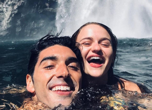 The Kissing Booth 2 stars Joey King and Taylor Zakhar Perez swim under a waterfall during their getaway with friends