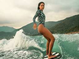 Lisa Haydon sizzles in printed swimsuit as she goes surfing in Hong Kong