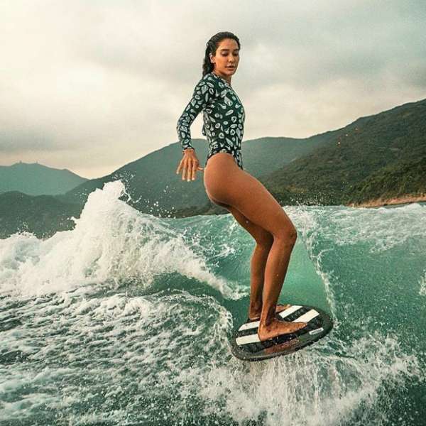 Lisa Haydon Sizzles In Printed Swimsuit As She Goes Surfing In Hong Kong Bollywood News