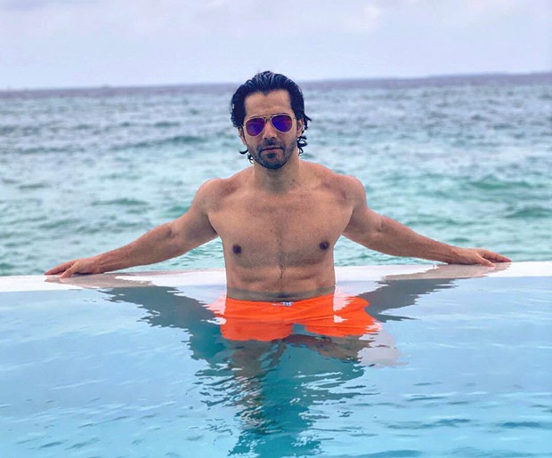 Varun Dhawan is chilling in the pool in Maldives flaunting his ab-tastic physique Varun Dhawan is chilling in the pool in Maldives flaunting his ab-tastic physique