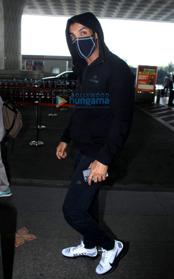 photos john abraham and nora fatehi snapped at the airport 2