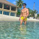 Tiger Shroff flaunts his taut muscles in yellow shorts