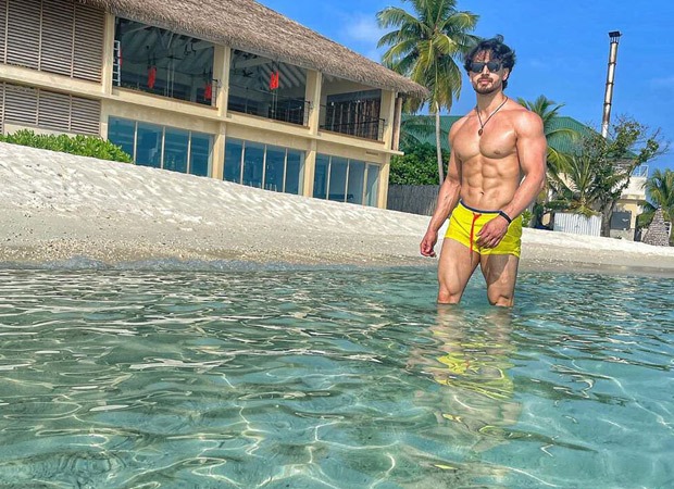 Tiger Shroff flaunts his taut muscles in yellow shorts