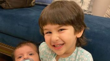 Taimur Ali Khan poses with a baby and he cannot stop smiling