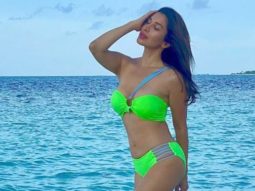 Sophie Choudry complements the blue sea as she poses in a neon green bikini worth Rs 6.3k
