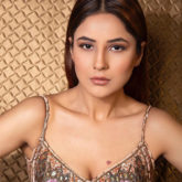 Shehnaaz Gill looks glamourous in this plunging neckline embellished dress by Rocky Star