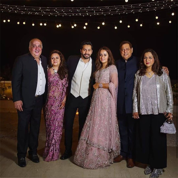 Newlyweds Varun Dhawan and Natasha Dalal strike a pose with their parents at the after-party 