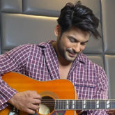 Sidharth Shukla poses with a guitar while flashing his million-dollar-smile leaving the fans smitten!
