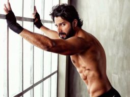 HAWT! Varun Dhawan flaunts his chiseled abs with an intense expression as he poses shirtless