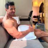 John Abraham poses with JUST a pillow, leaves his fans drooling!